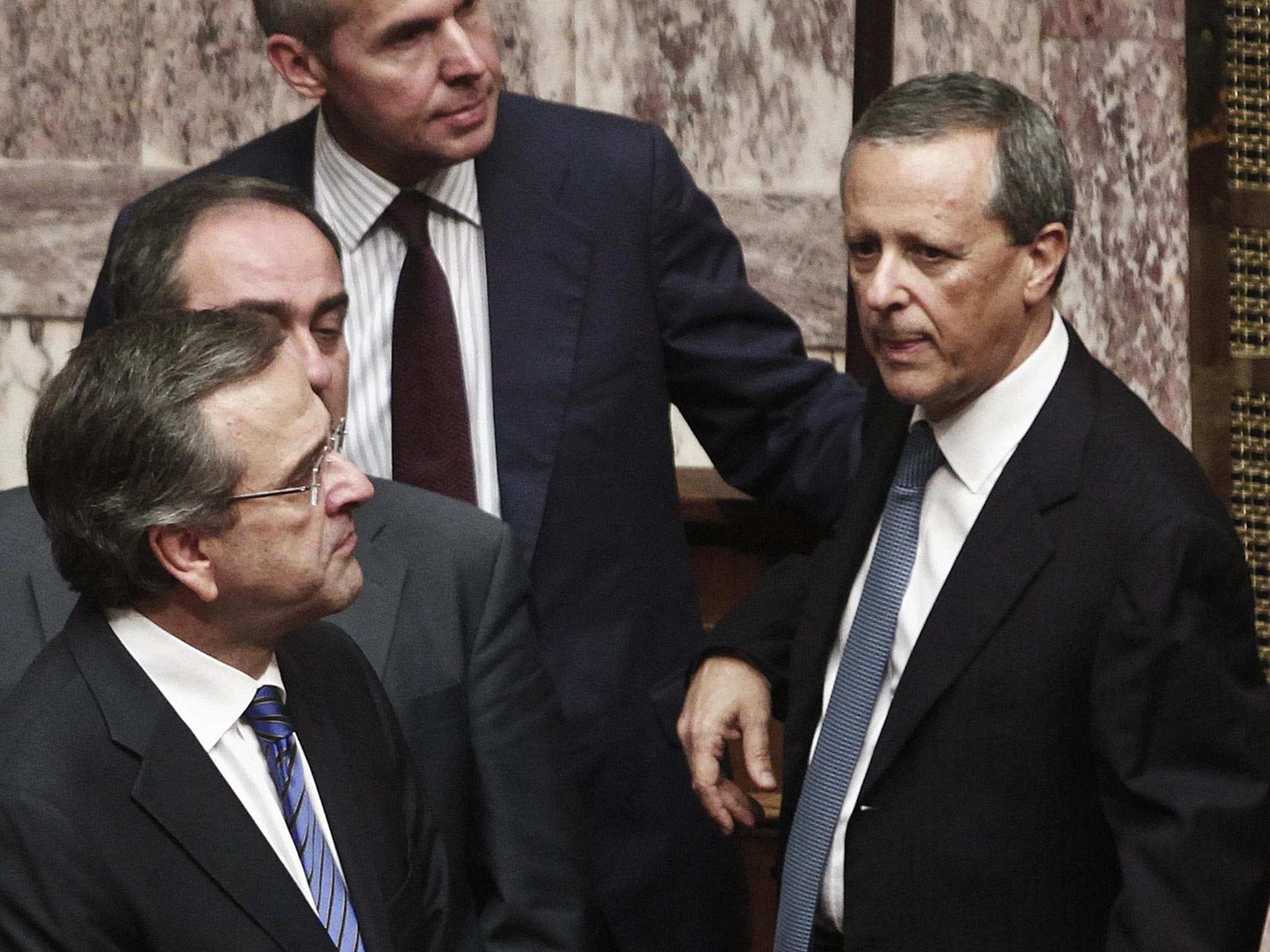 Government Secretary General Takis Baltakos (right) admitted in the video recording the government's intervention in the country's judicial process to elicit prosecutions of Golden Dawn lawmakers