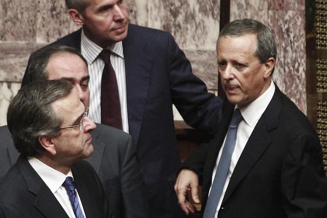 Government Secretary General Takis Baltakos (right) admitted in the video recording the government's intervention in the country's judicial process to elicit prosecutions of Golden Dawn lawmakers
