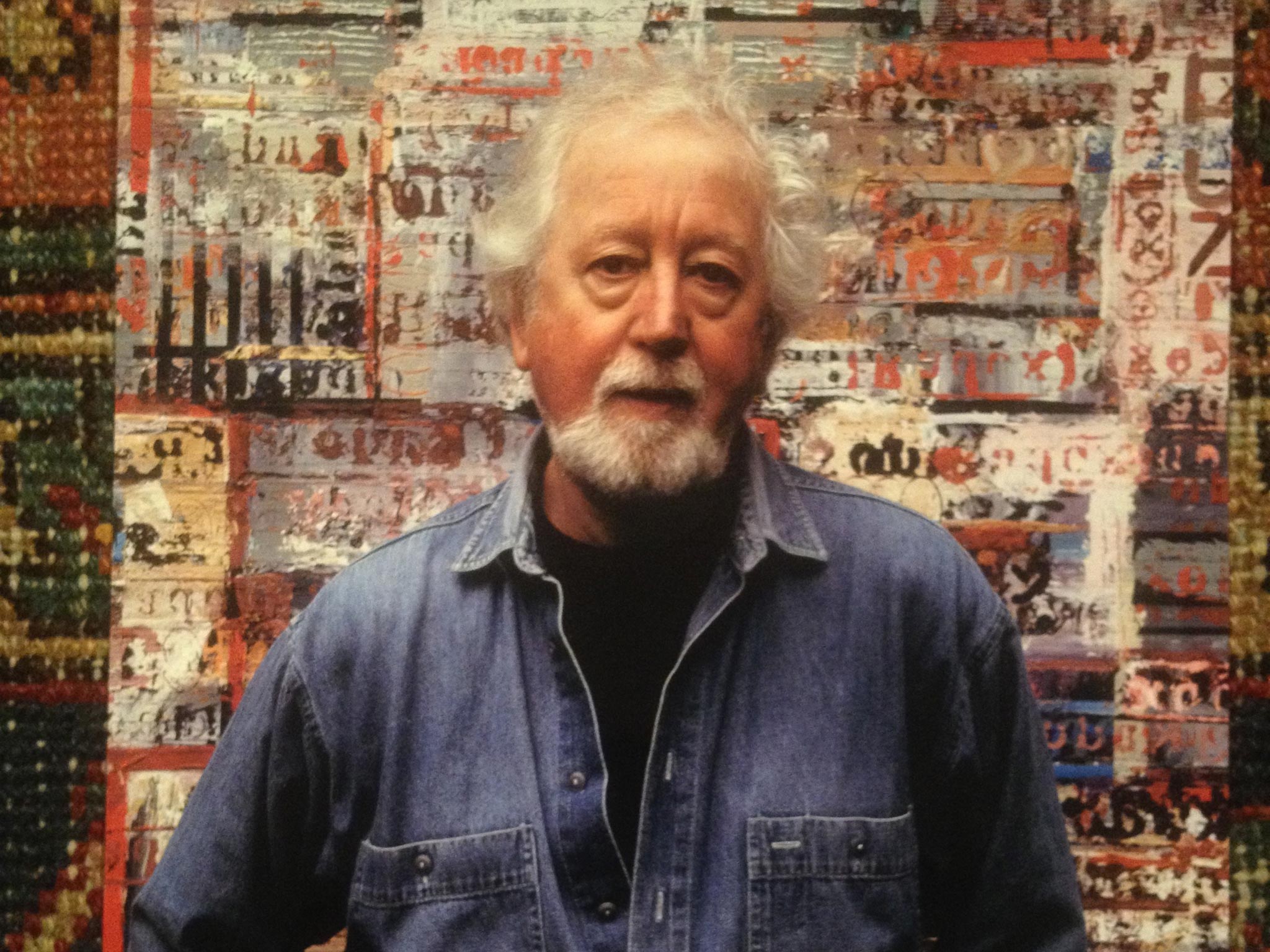 John Uzzell Edwards in front of one of his later pieces, which were inspired by patchwork quilts