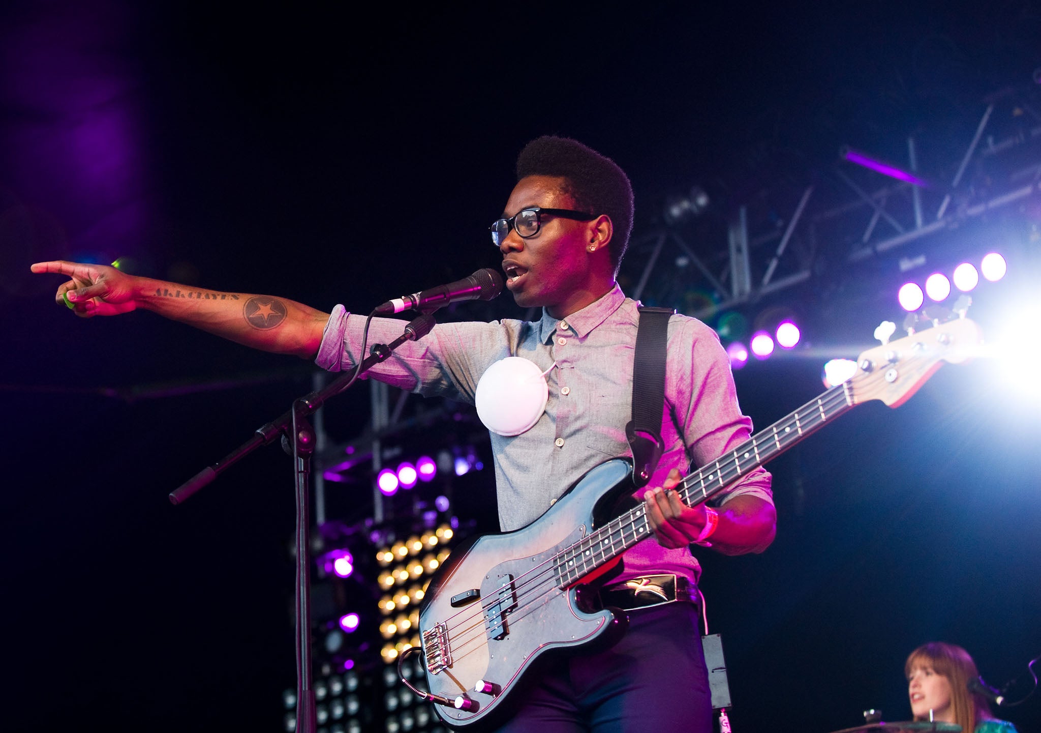Gbenga Adelekan of Metronomy performs on stage in 2011