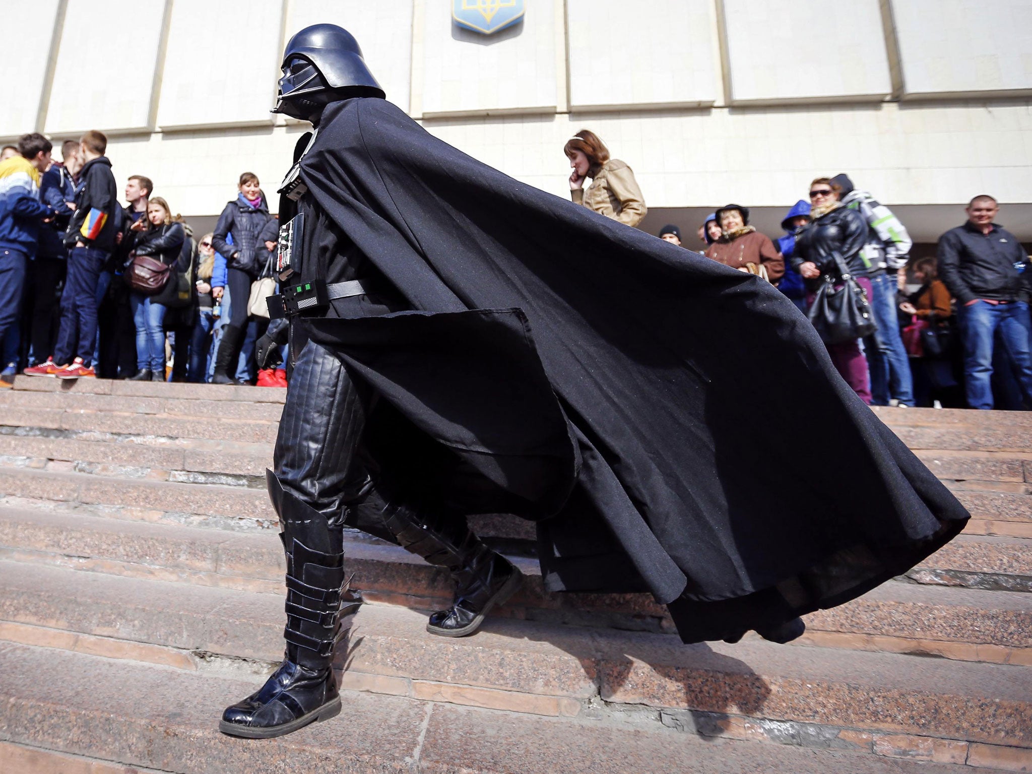 'Darth Vader', the leader of the Internet Party of Ukraine, walks during a rally in front of the Ukrainian Central Elections Commission in Kiev. He has submitted documents to the Ukrainian Central Elections Commission to register as a candidate for Ukrain