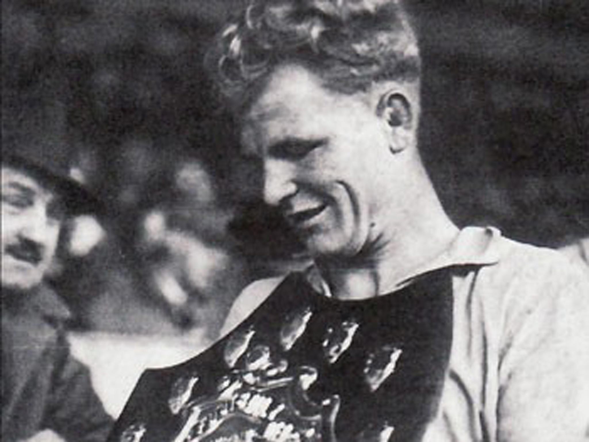 Fred Stansfield takes the trophy for Cardiff City’s Third Division
(South) title in 1947