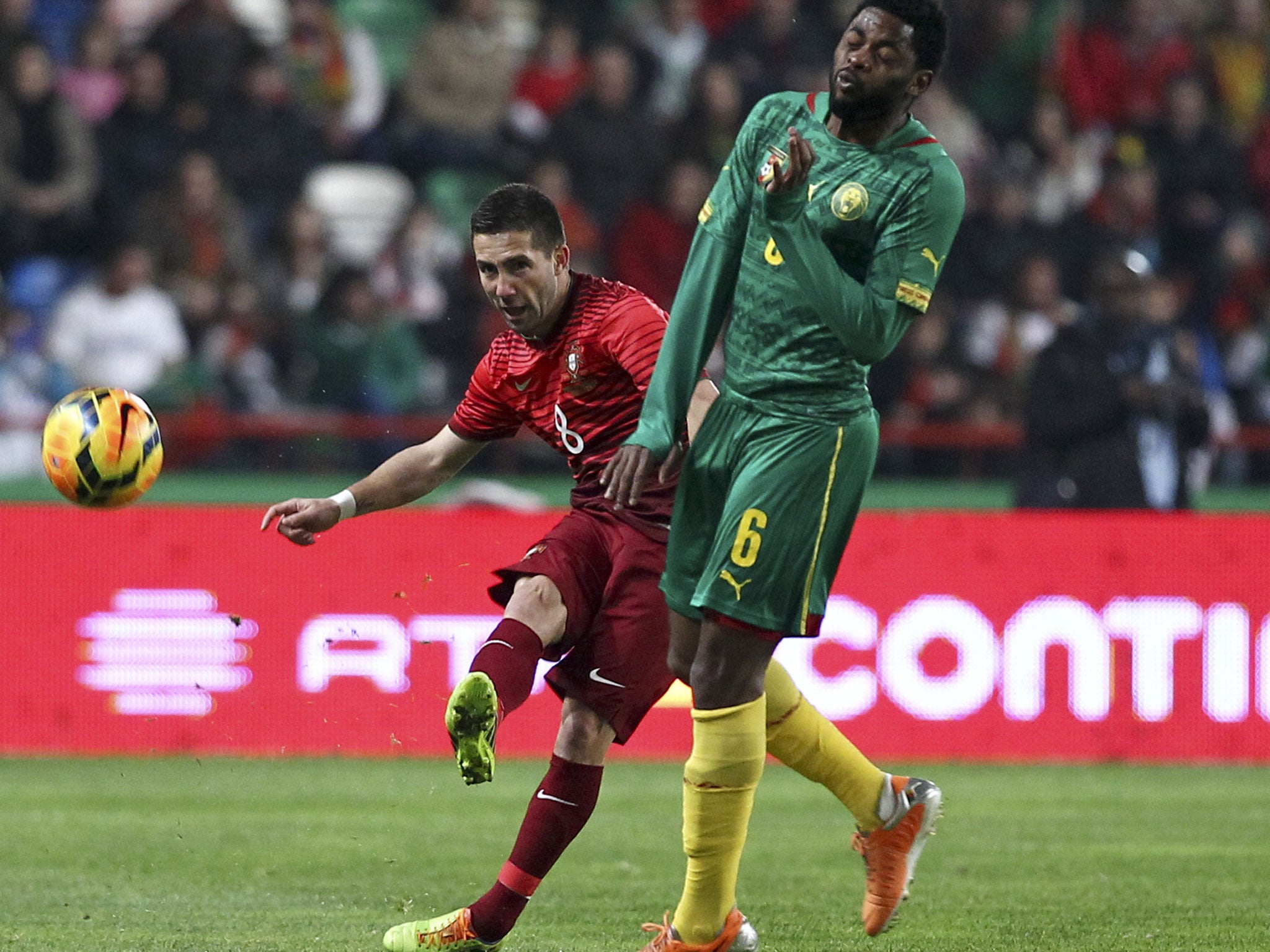 Alex Song (right) of Cameroon