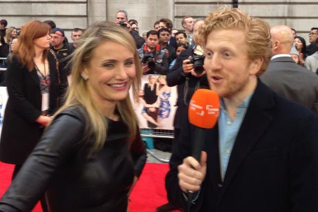 Luke Blackall interviews Cameron Diaz on the red carpet for the premiere of 'The Other Woman'