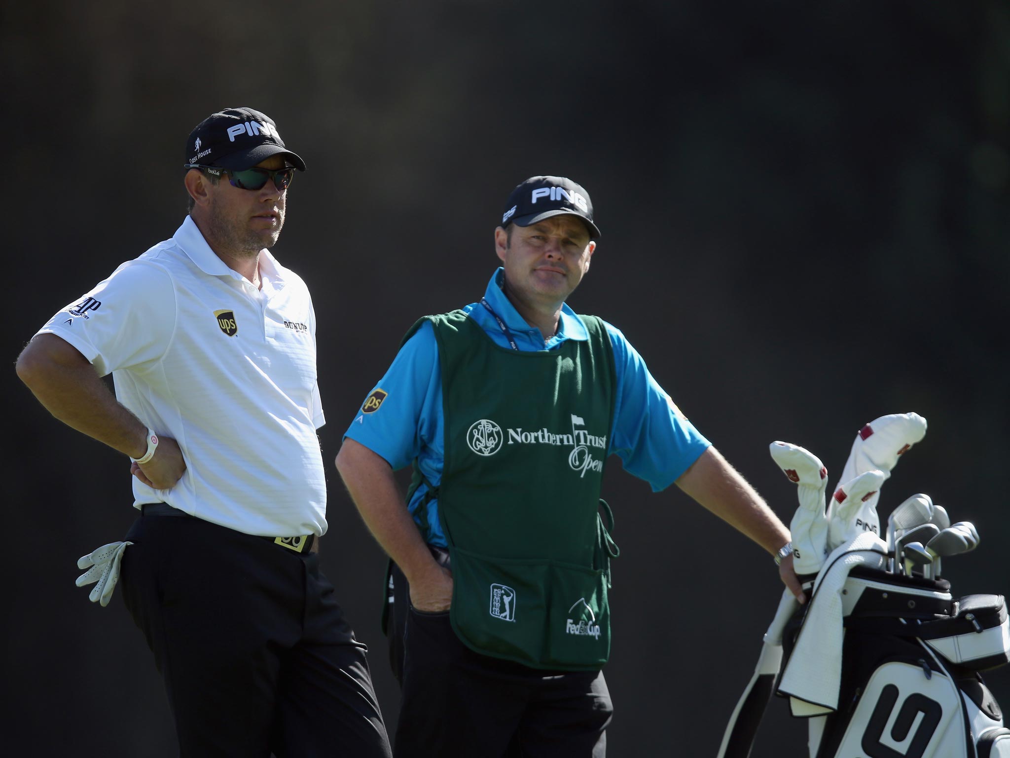 Caddie Billy Foster (right) on course with Lee Westwood