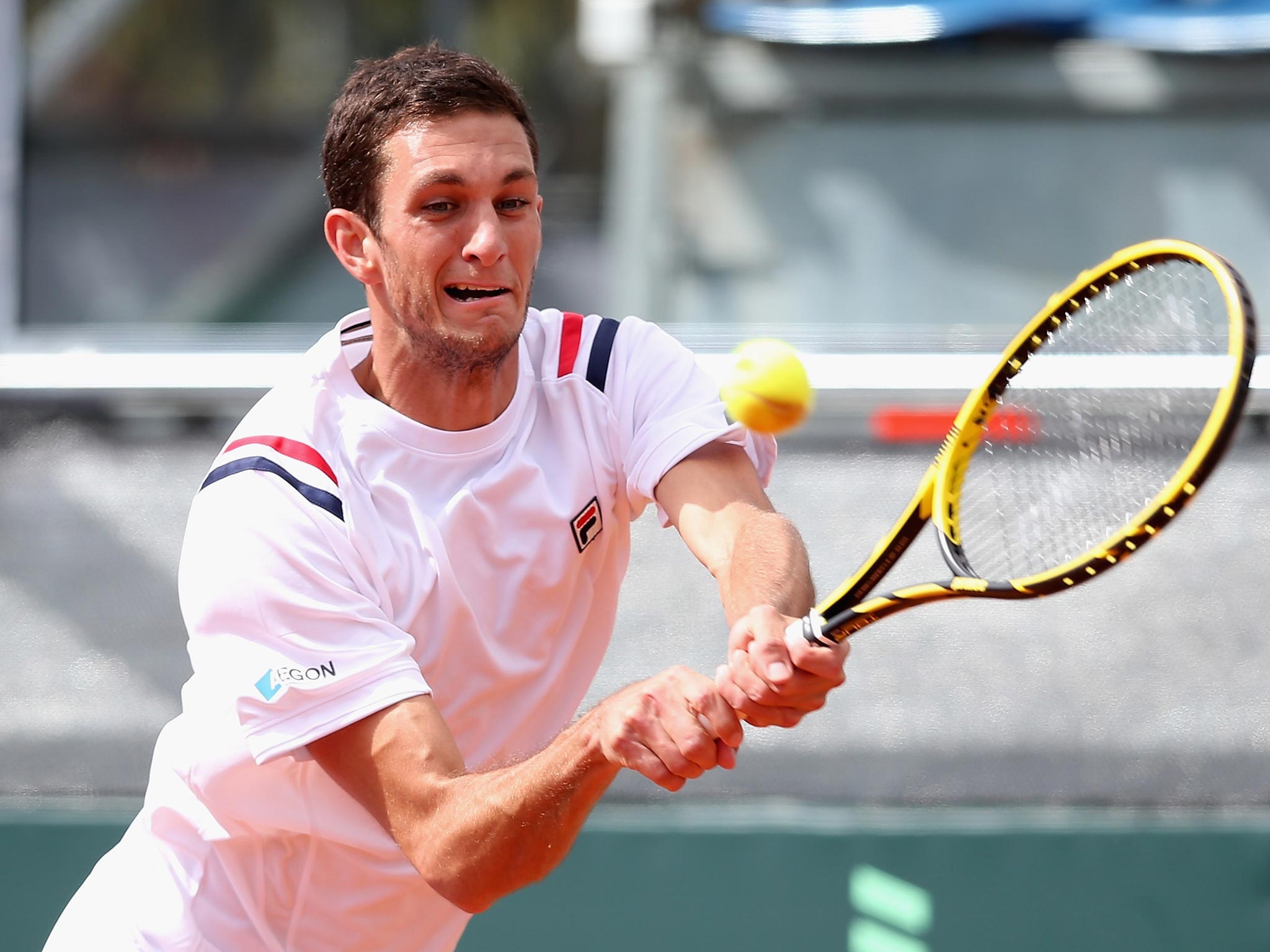 James Ward fought hard but was outclassed by Fabio Fognini as Britain got off to a losing start