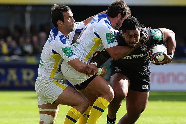 Manu Tuilagi attempts to break through the Clermont Auvergne defence