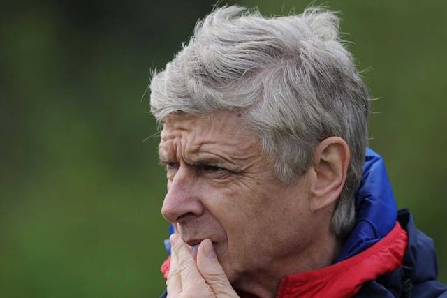 Wenger at a training session