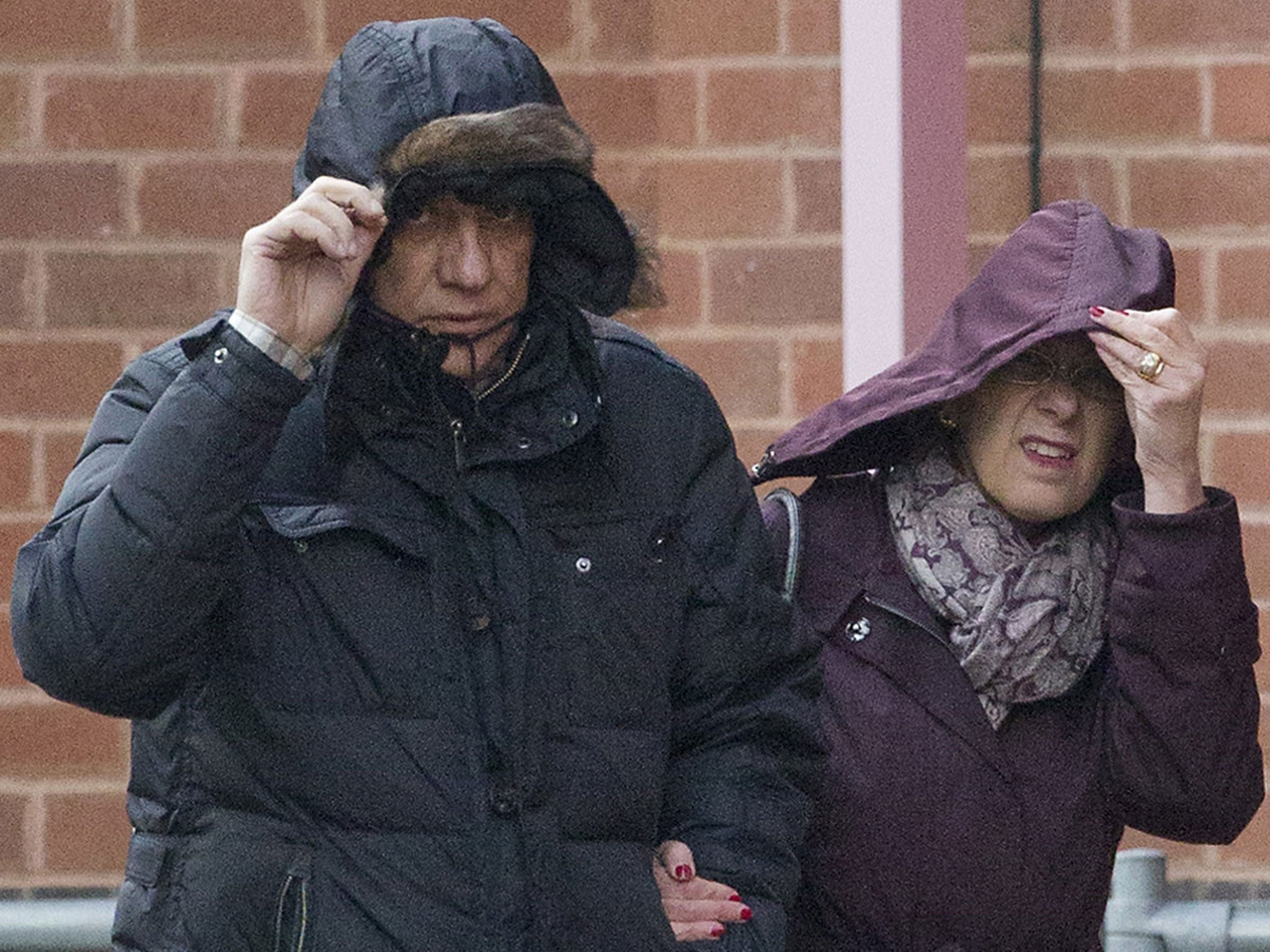 Convicted mafia boss Domenico Rancadore arrives with his wife Anne Skinner to report at Uxbridge Police Station in West London