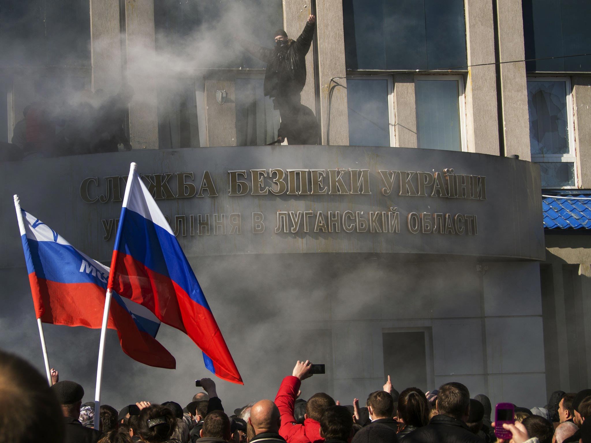 Pro-Russian activists hold a rally in front of Ukraine's regional security service of Ukraine in Lugansk