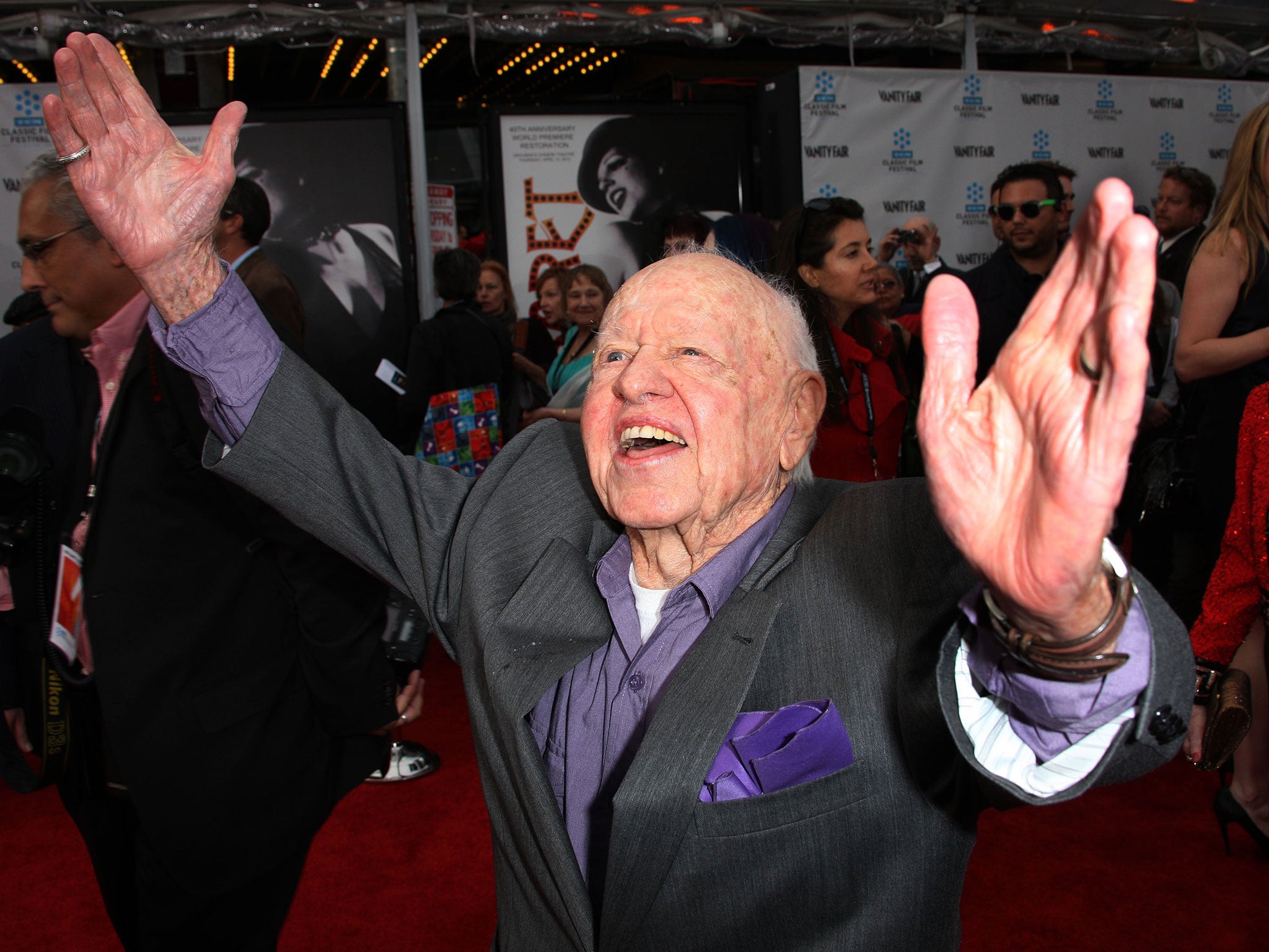 Mickey Rooney, the pint-size, precocious actor and all-around talent whose more than 80-year career spanned silent comedies, Shakespeare, Judy Garland musicals, Andy Hardy stardom, television and the Broadway theater, died Sunday at age 93.