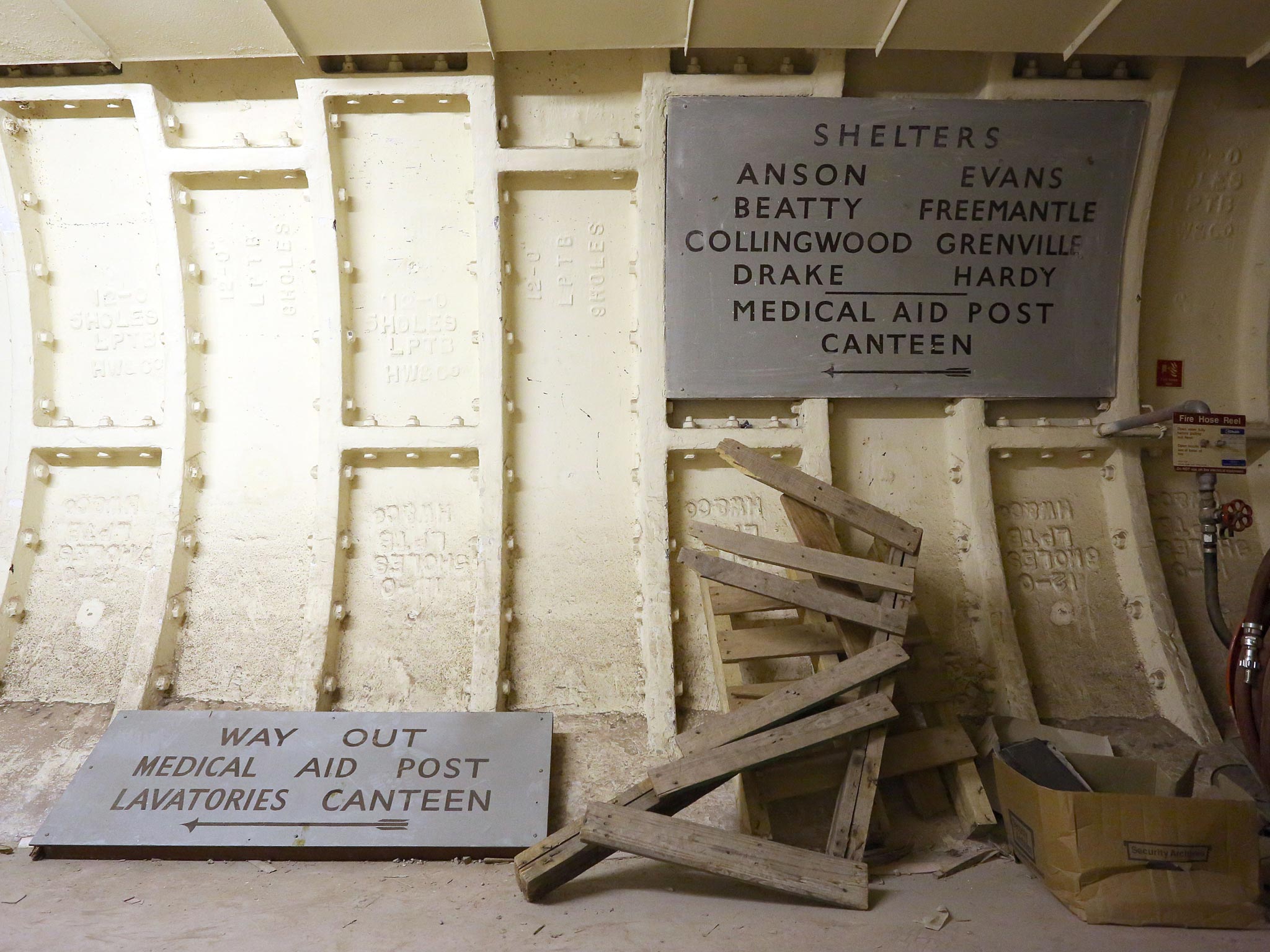 Signs in a deep level WWII air raid shelter beneath Clapham Common Underground Station in London (Susannah Ireland)