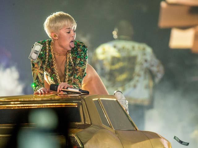 Miley Cyrus performs onstage during her 'Bangerz' tour 
