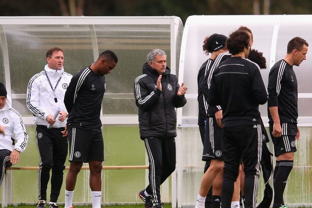Jose Mourinho takes training with the Chelsea team ahead of their Champions League game against PSG
