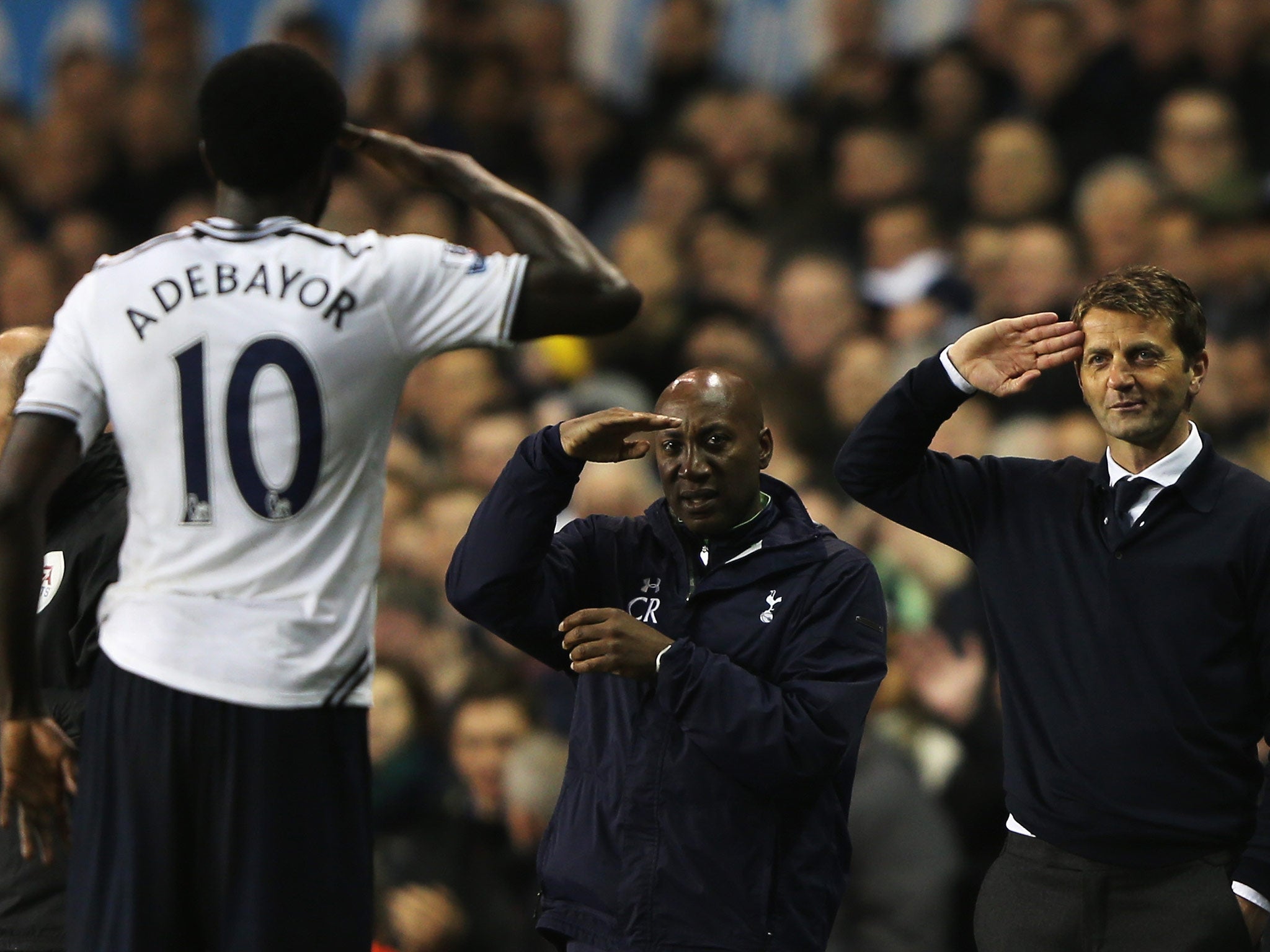 Emmanuel Adebayor of Tottenham Hotspur celebrates scoring his second goal against Sunderland by saluting manager Tim Sherwood this week
