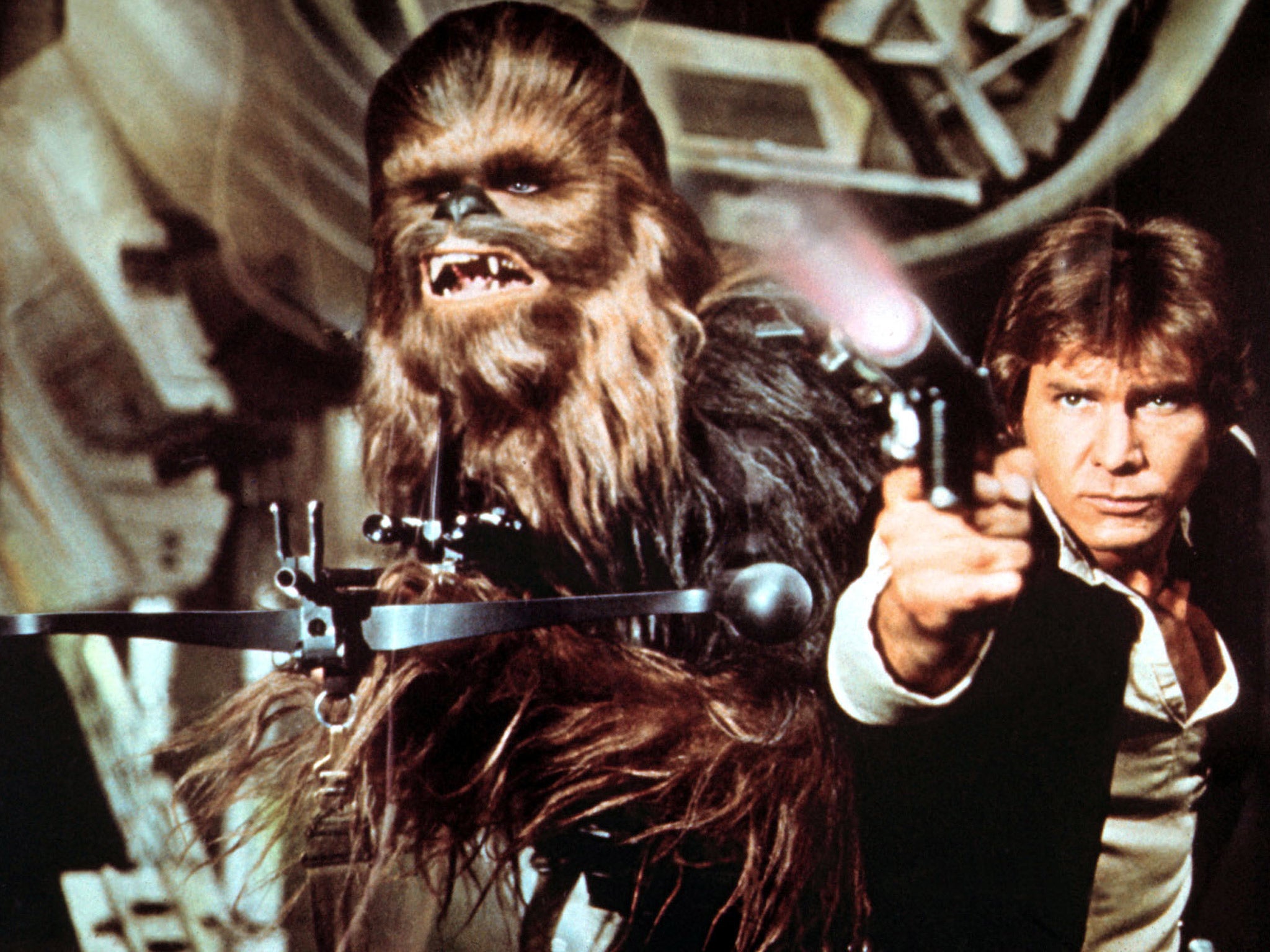 Peter Mayhew as Chewbacca alongside Harrison Ford's Han Solo in 'Star Wars'