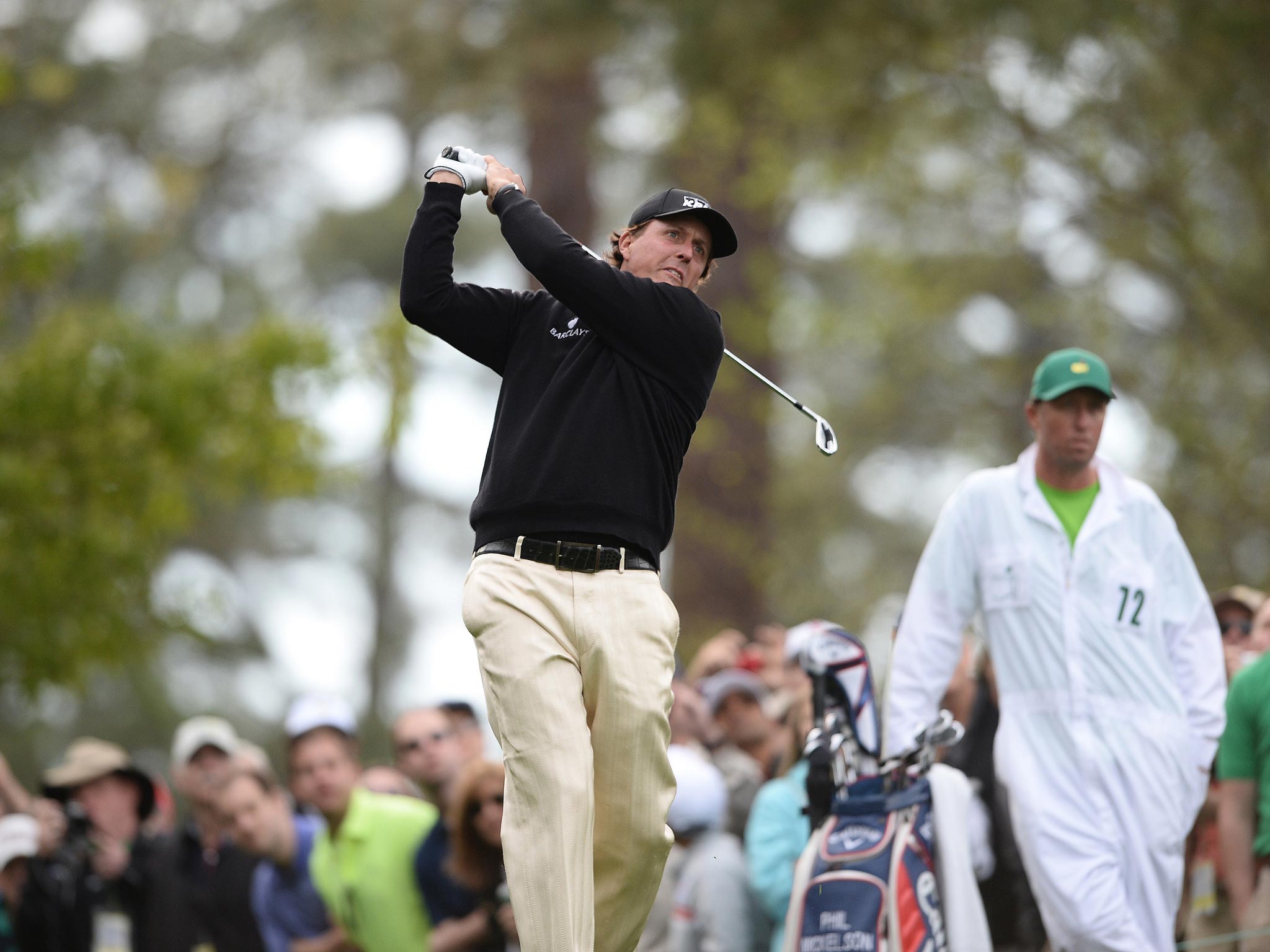 Phil Mickelson practices at Augusta National ahead of the 2014 Masters