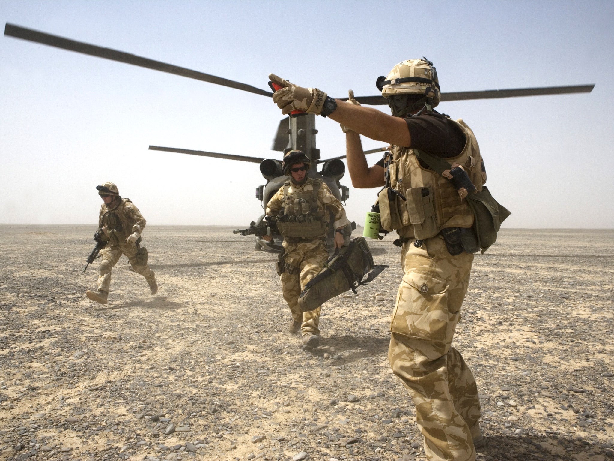 British Soldiers are deployed from Chinook helicopters in the desert, Garmsir District, Southern Helmand Province