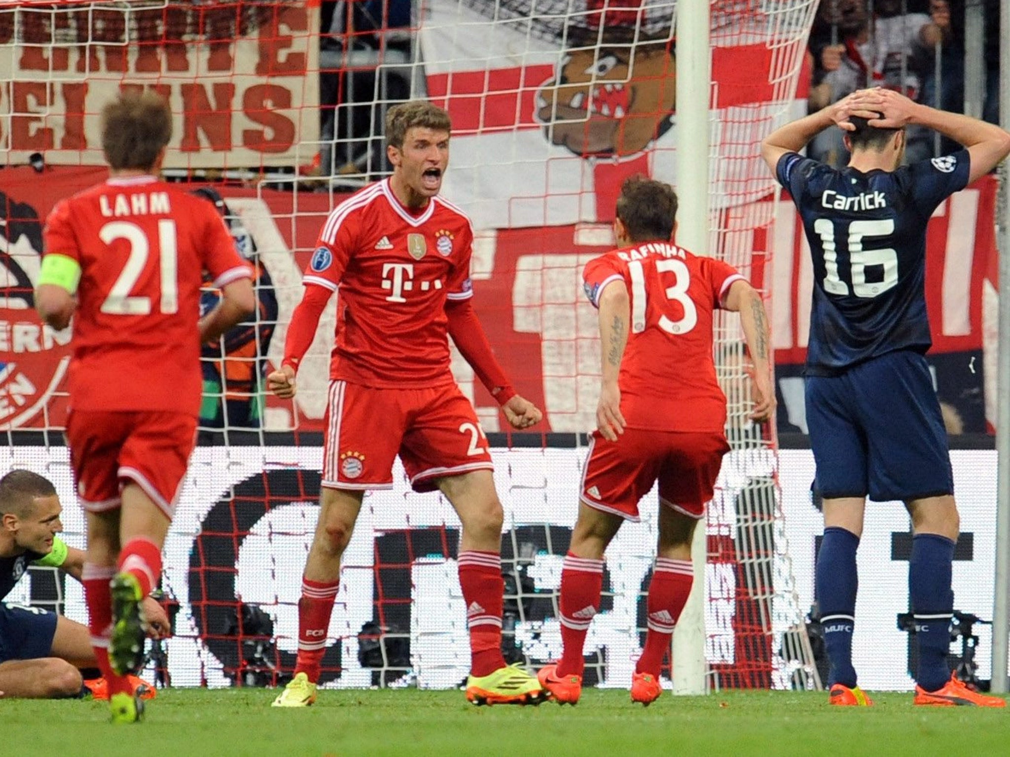 Thomas Muller celebrates putting Bayern 2-1 up