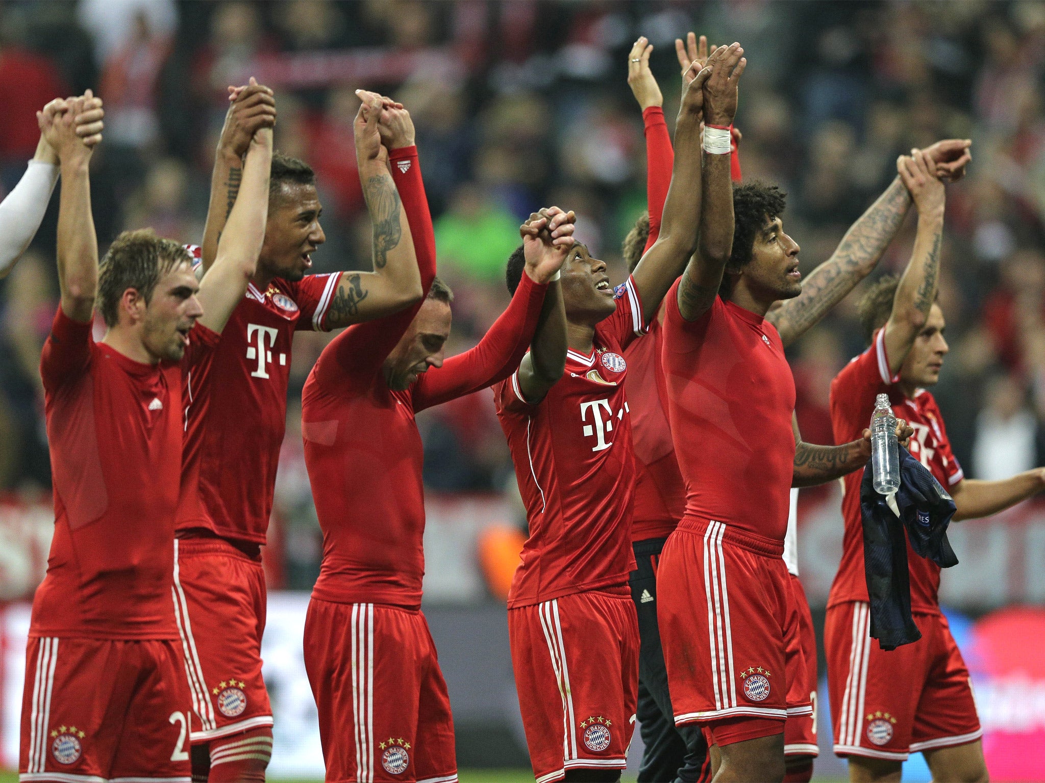 The Bayern players salute their fans after reaching yet another Champions League semi-final