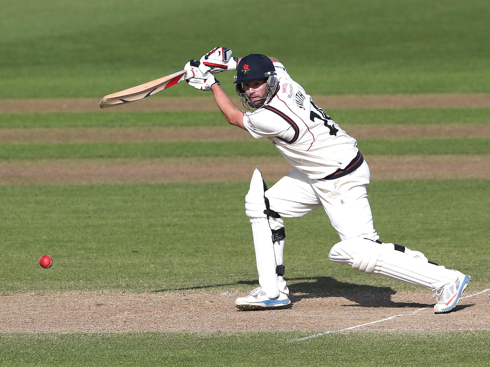 Tom Smith scored 76 and took five wickets for Lancashire but could not prevent a Notts victo