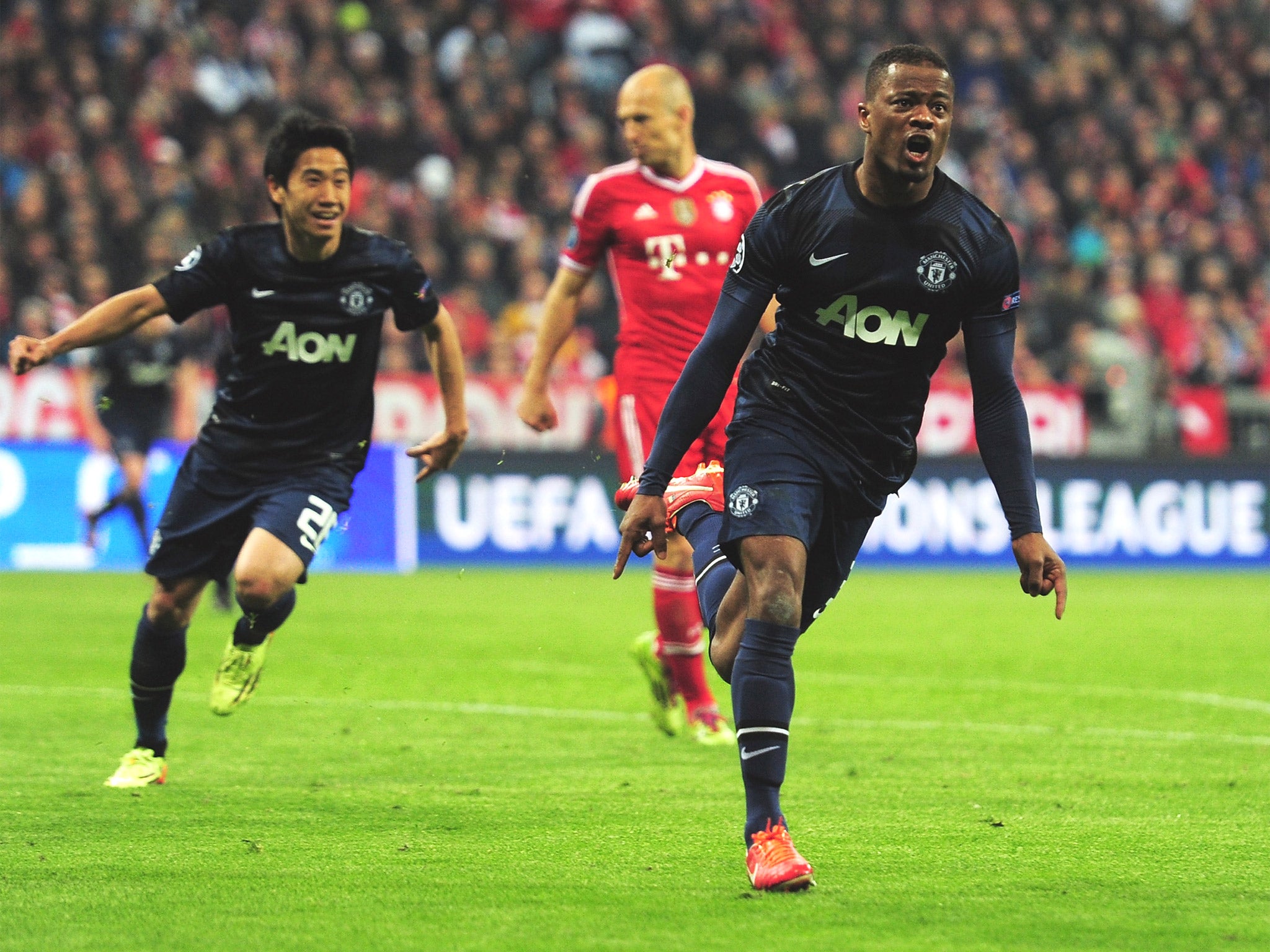 Patrice Evra celebrates opening the scoring (GETTY)