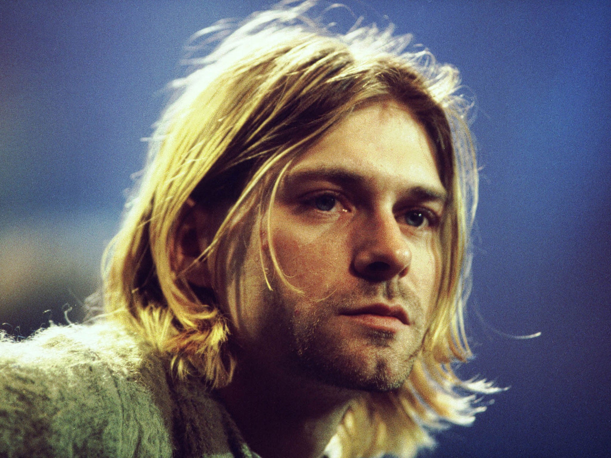 Kurt Cobain plays a gig with Nirvana in 1993, before his death the following year aged 27
