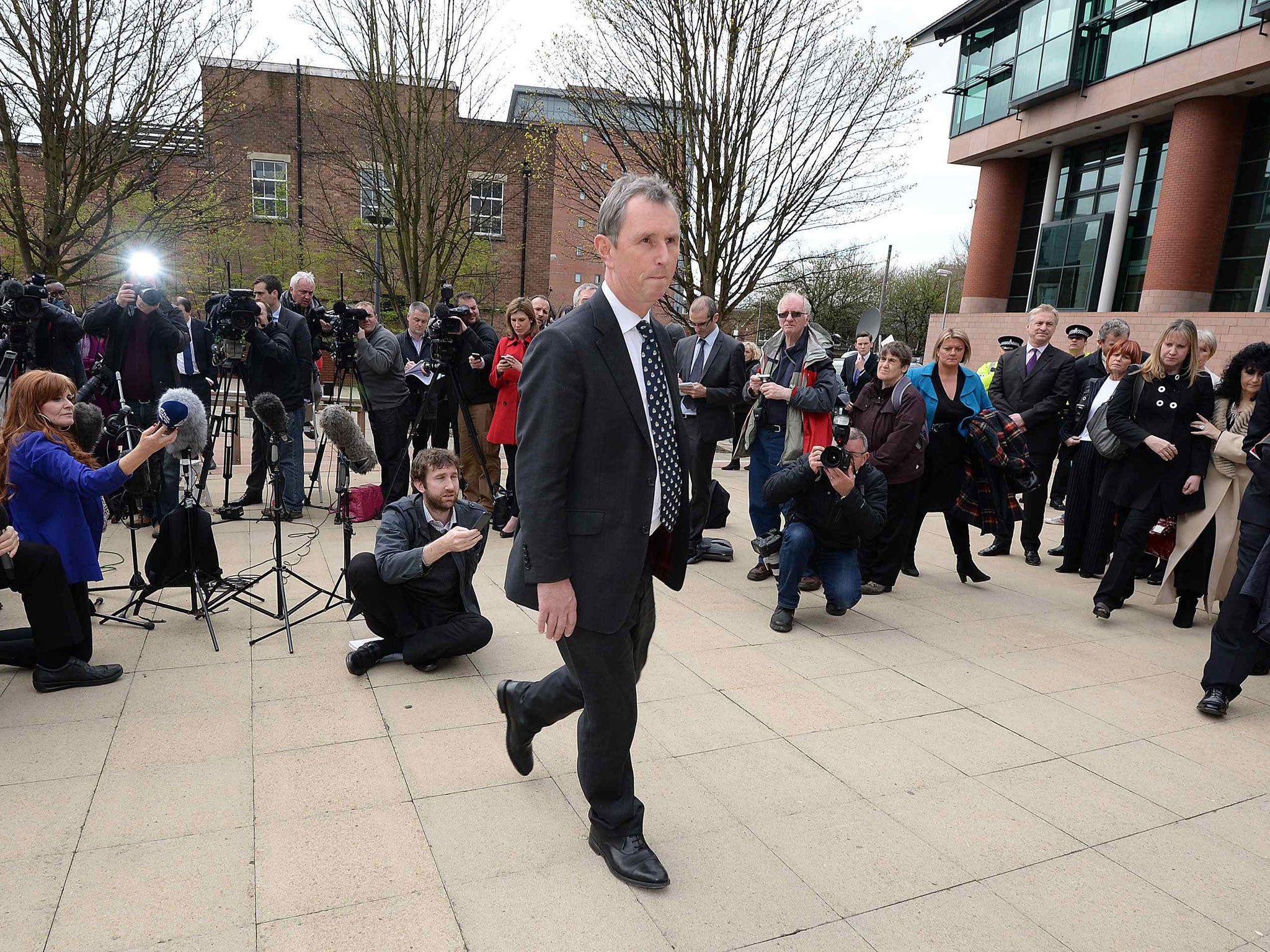 Former deputy speaker of the House of Commons Nigel Evans leaves after speaking to the media outside Preston Crown Court