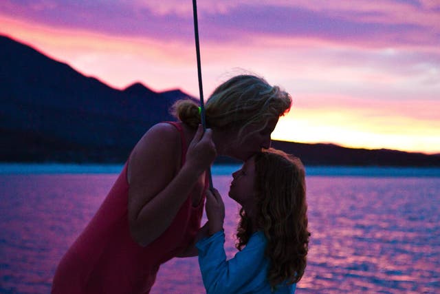 Shore start: Diane Selkirk and her daughter, Maia (now aged 12), at sunset in Mexico