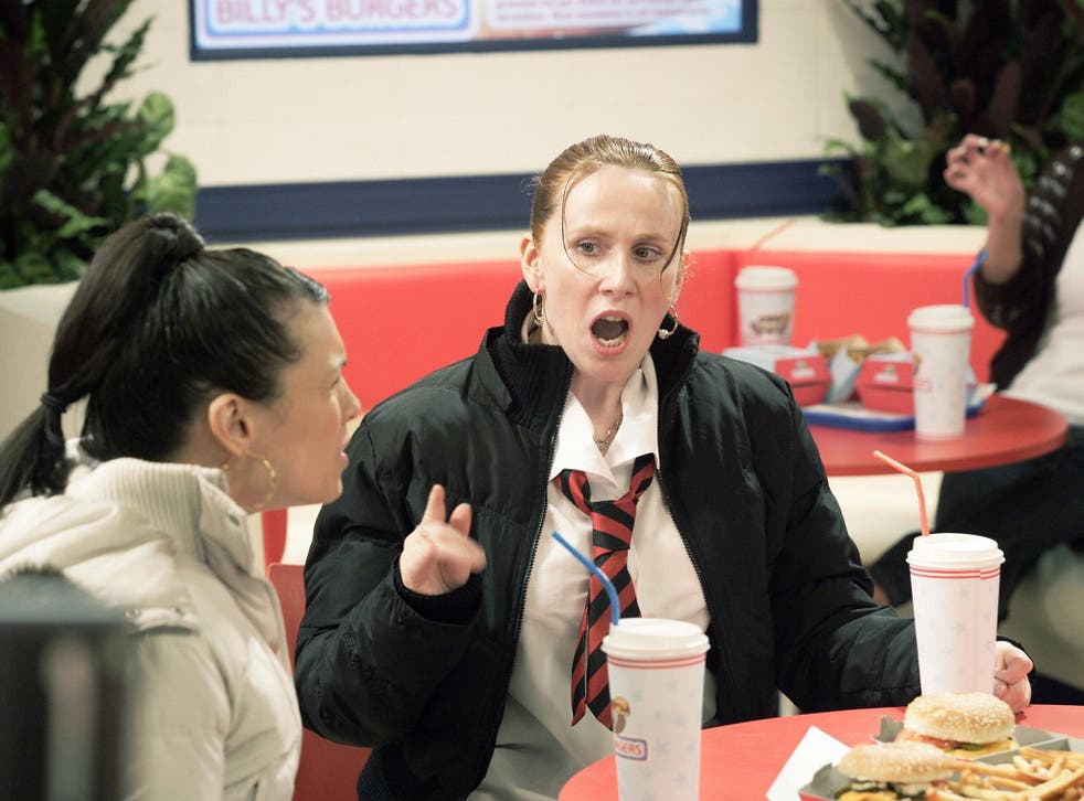 Catherine Tate as her character Lauren Cooper, who is known for her grammatically incorrect catchphrase: "I ain't bovvered'