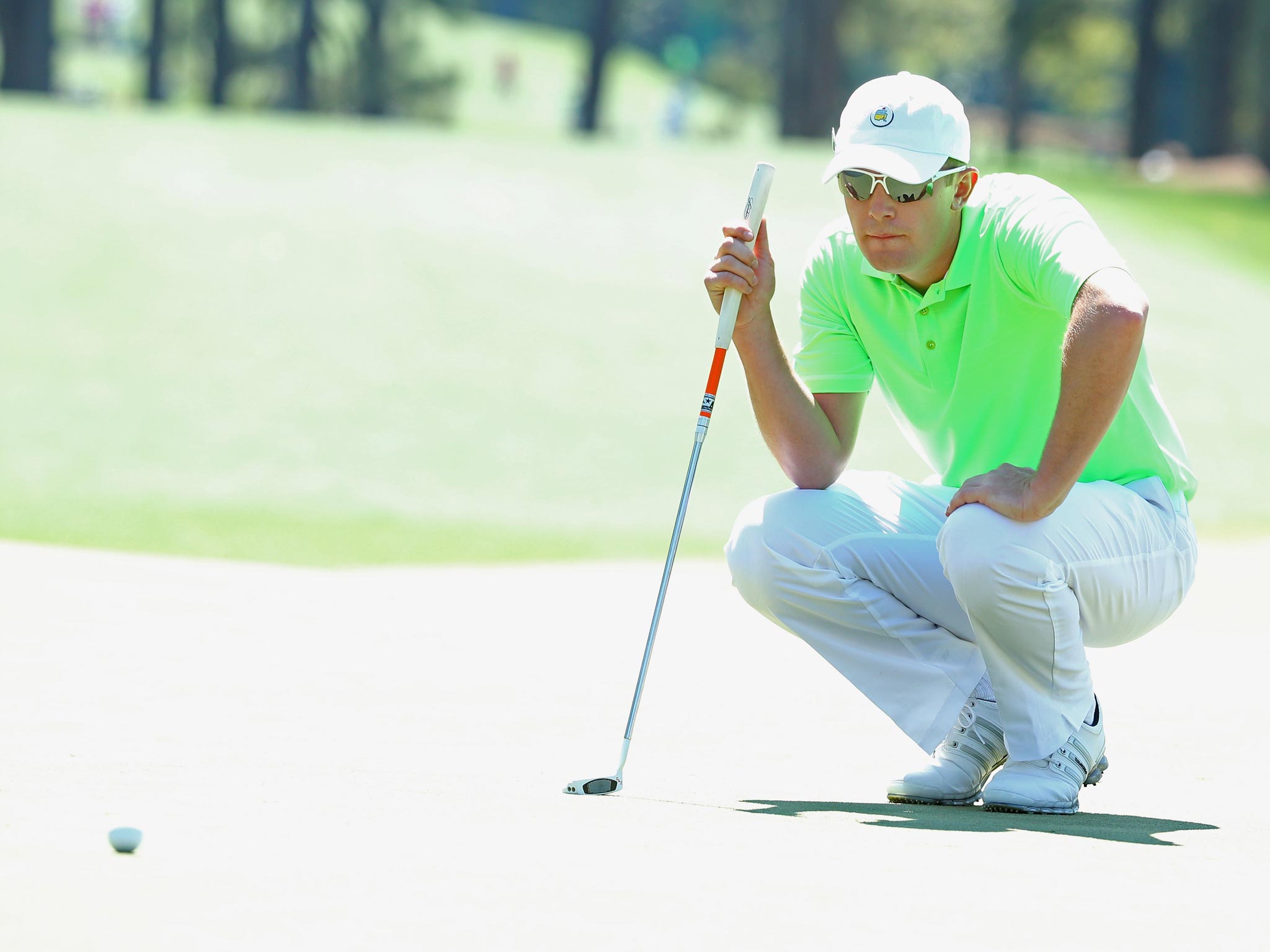 Amateur Garrick Porteous of England putts on the first green during the first round of the 2014 Masters Tournament