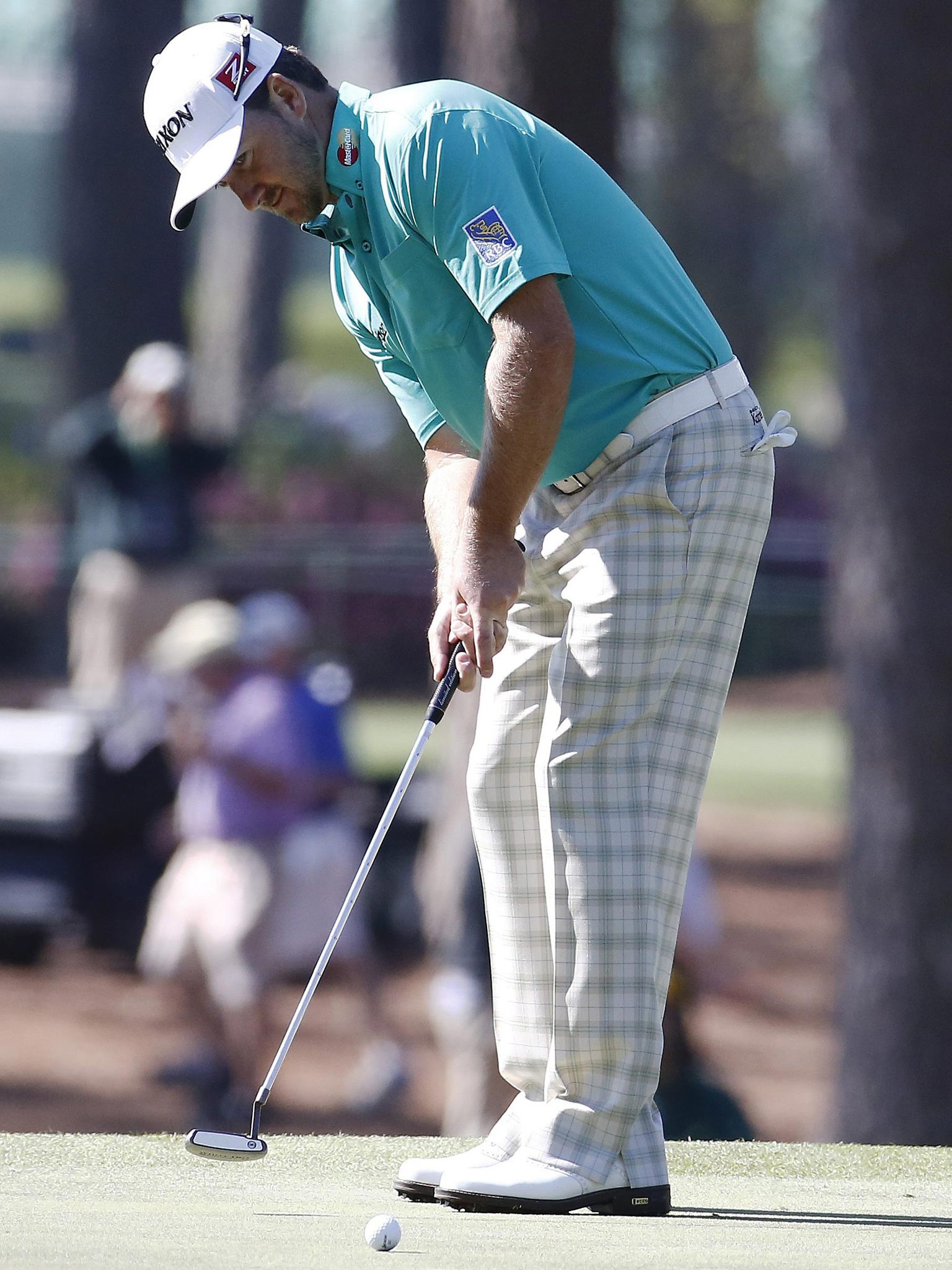 Graeme McDowell is the best putter on the PGA Tour this season
but even he struggled on the fast greens yesterday