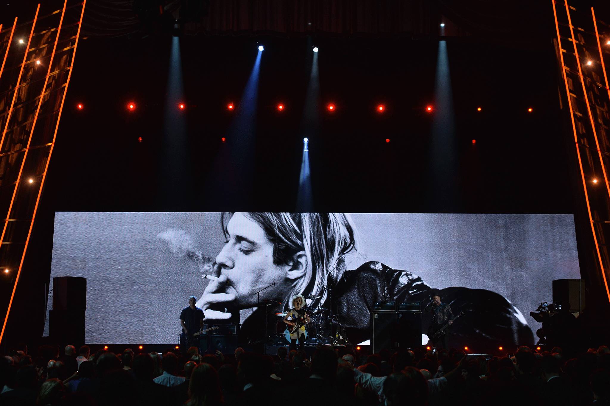 St Vincent performs backed by a picture of the late Kurt Cobain