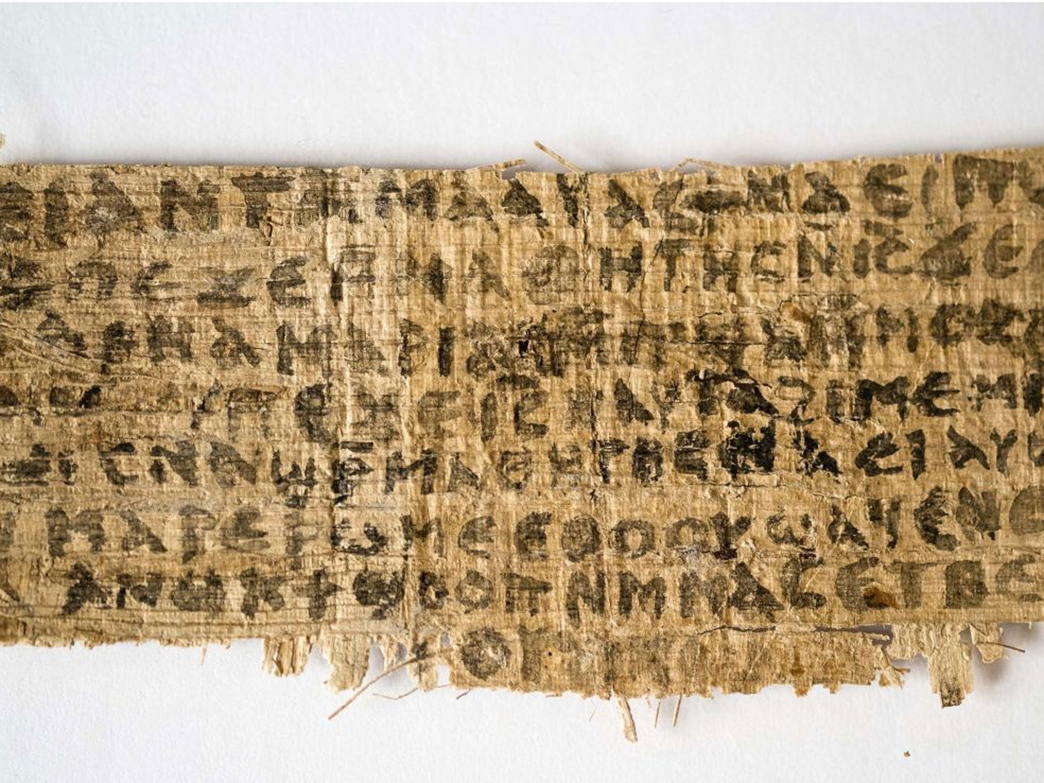 The Gospel of Jesus' wife: File photo released by Harvard University shows a fragment of papyrus that divinity professor Karen L. King said is the only existing ancient text that quotes Jesus explicitly referring to having a wife.