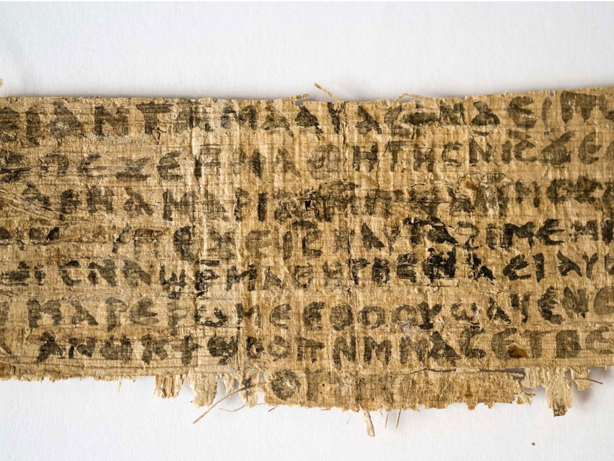 Jesus' wife: File photo released by Harvard University shows a fragment of papyrus that divinity professor Karen L. King said is the only existing ancient text that quotes Jesus explicitly referring to having a wife.