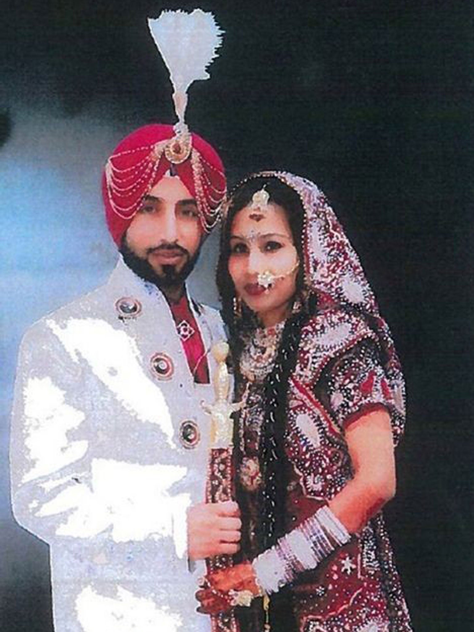 Undated handout photo issued by West Midlands Police of Jasvir Ginday, 29, with his wife Varkha Rani, 24, on their wedding day, after gay bank worker Jasvir Ginday, 29, was convicted of murdering his wife before burning her body just months after they tie