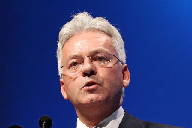 Minister of State for International Development Alan Duncan presents at the closing ceremony of the World Islamic Economic Forum at ExCel on October 31, 2013 in London, England.