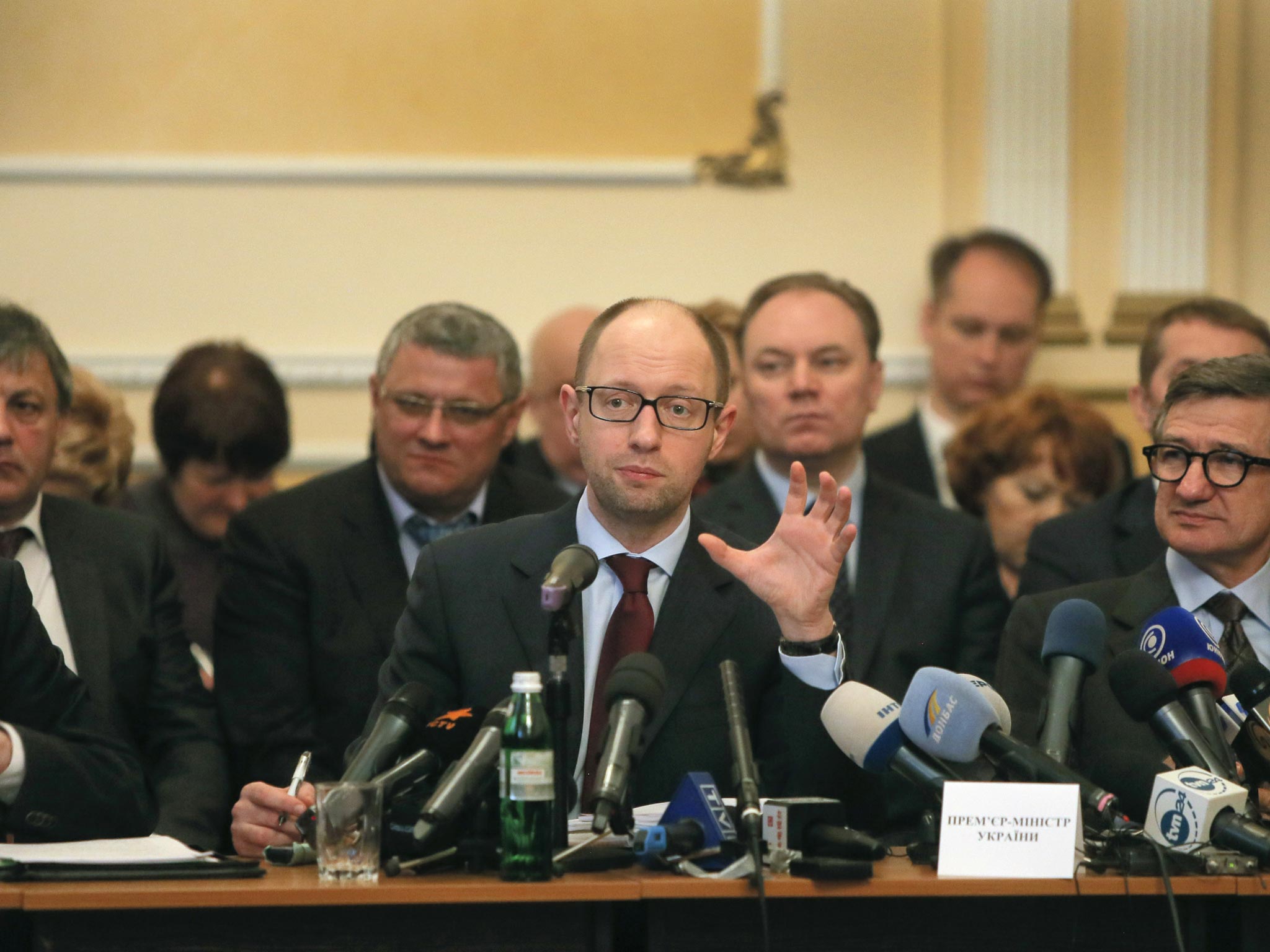 Ukraine's prime minister Arseniy Yatsenyuk (center) speaks during his meeting with regional leaders in Donetsk, Ukraine