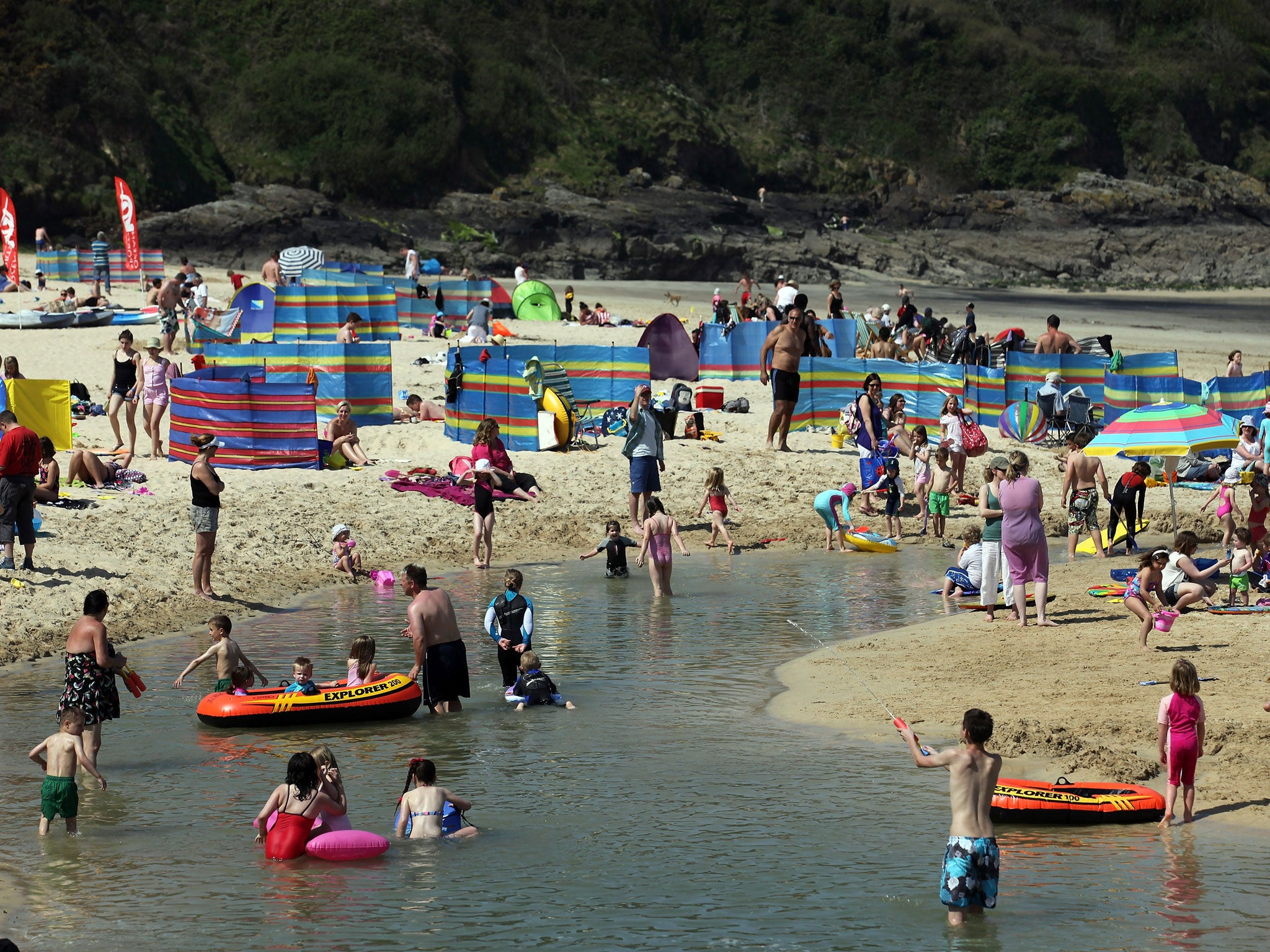 People enjoy the fine weather in St Ives, Cornwall, England on an Easter weekend.