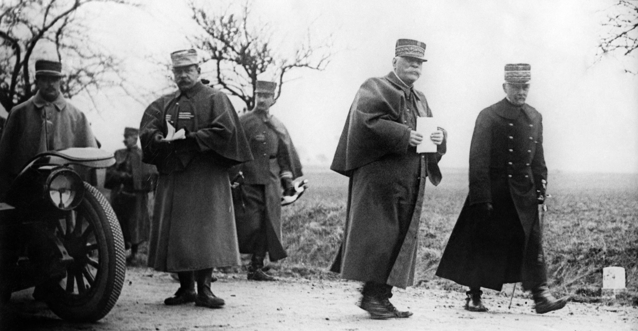 French General Joseph Joffre (second right), Commander- in-Chief of the French Armies, and General Michel Joseph Maunoury (right) on the front during the First Battle of the Marne. Six hundred scarlet taxis were requisitioned, at a cost of Fr70,102, to fe