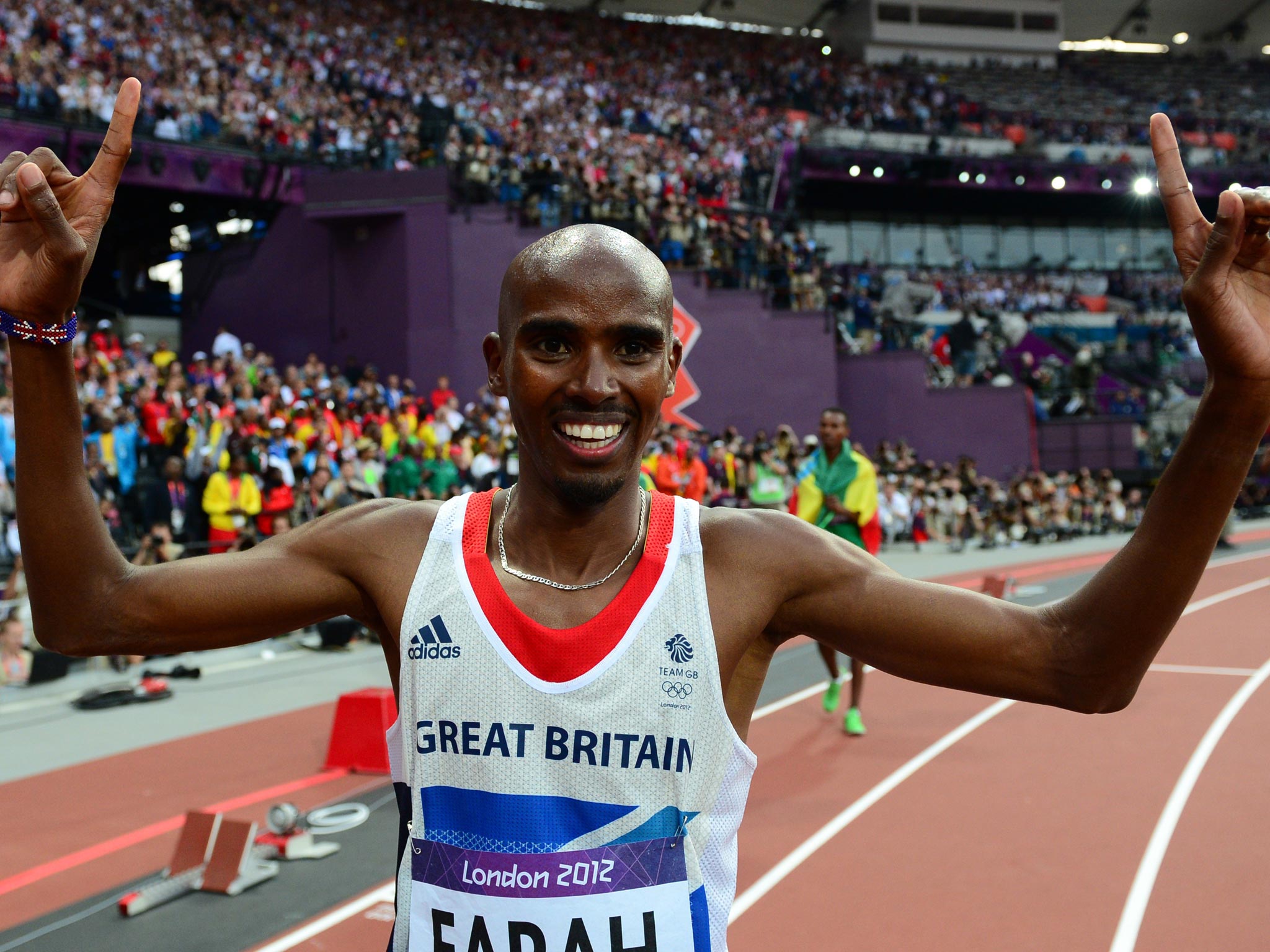 Mo Farah celebrates his 5,000m victory at the 2012 Olympics