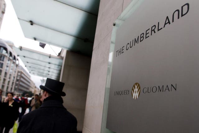 Three wealthy tourists were bludgeoned in a hammer attack after disturbing an intruder in their room at the four-star Cumberland Hotel near Marble Arch