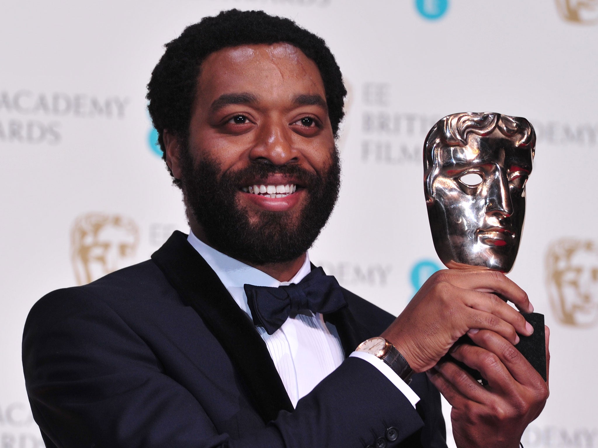 Chiwetel Ejiofor poses with the award for a leading actor for his work on the film '12 Years a Slave'