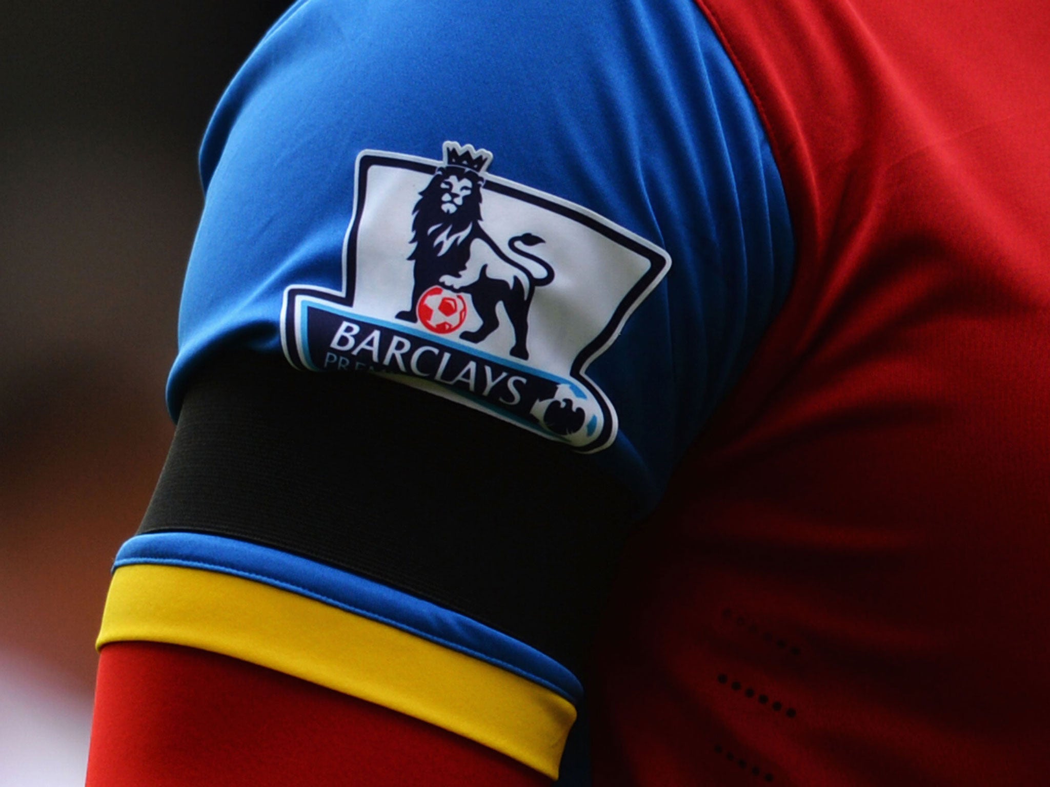 A Crystal Palace player sporting a black armband