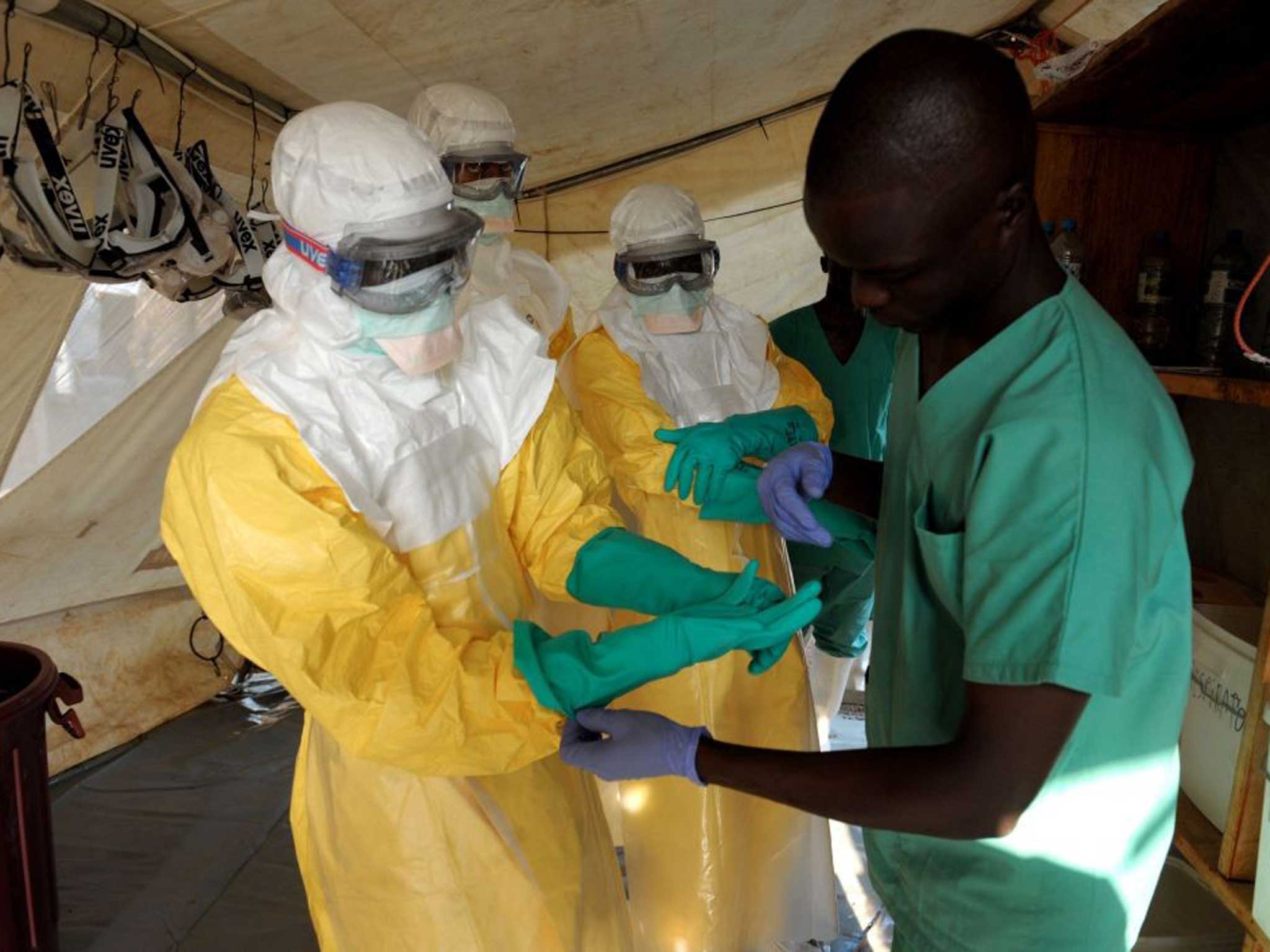 Suit Up: Ebola is spread by contact with bodily fluids, so protection is vital
