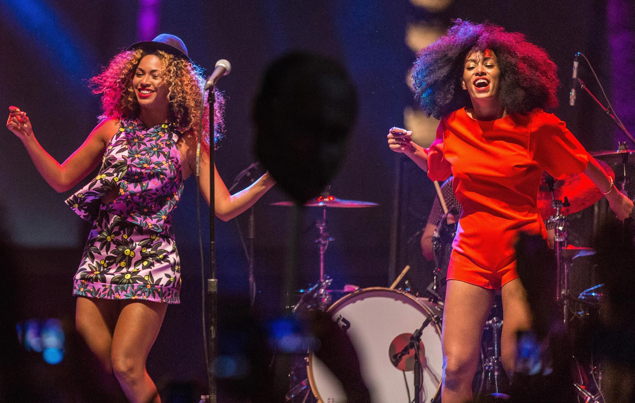 Singer Beyonce performs with her sister Solange onstage on Day 2 of the 2014 Coachella Valley Music & Arts Festival