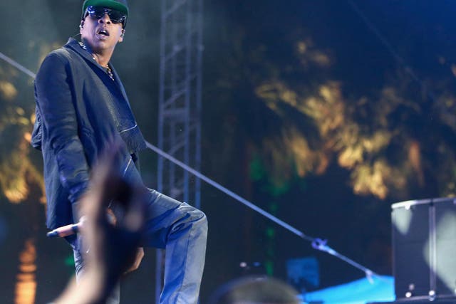 Rapper Jay Z performs onstage during day 2 of the 2014 Coachella Festival
