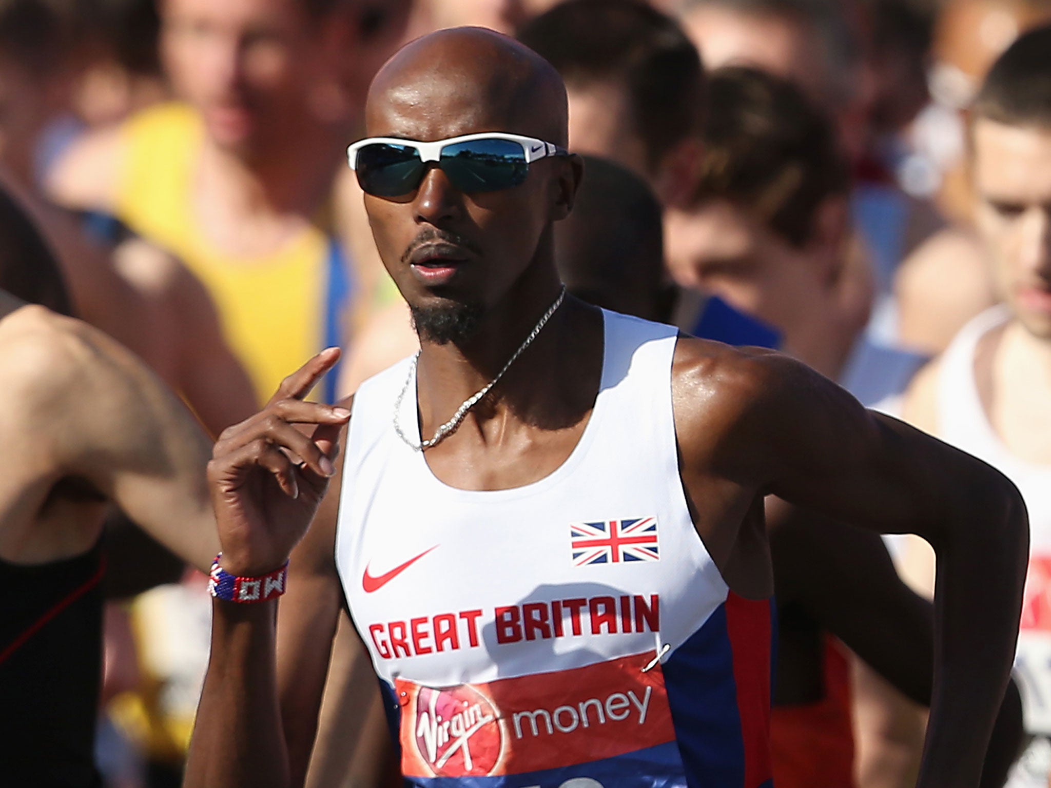 Mo Farah takes part in the 2014 London Marathon