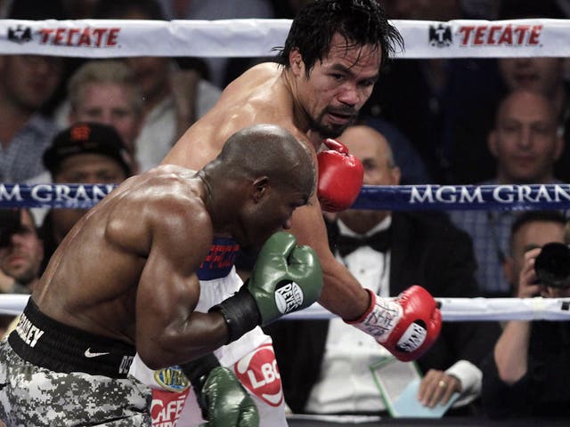 Manny Pacquiao lands a blow on Tim Bradley in their rematch on Saturday night