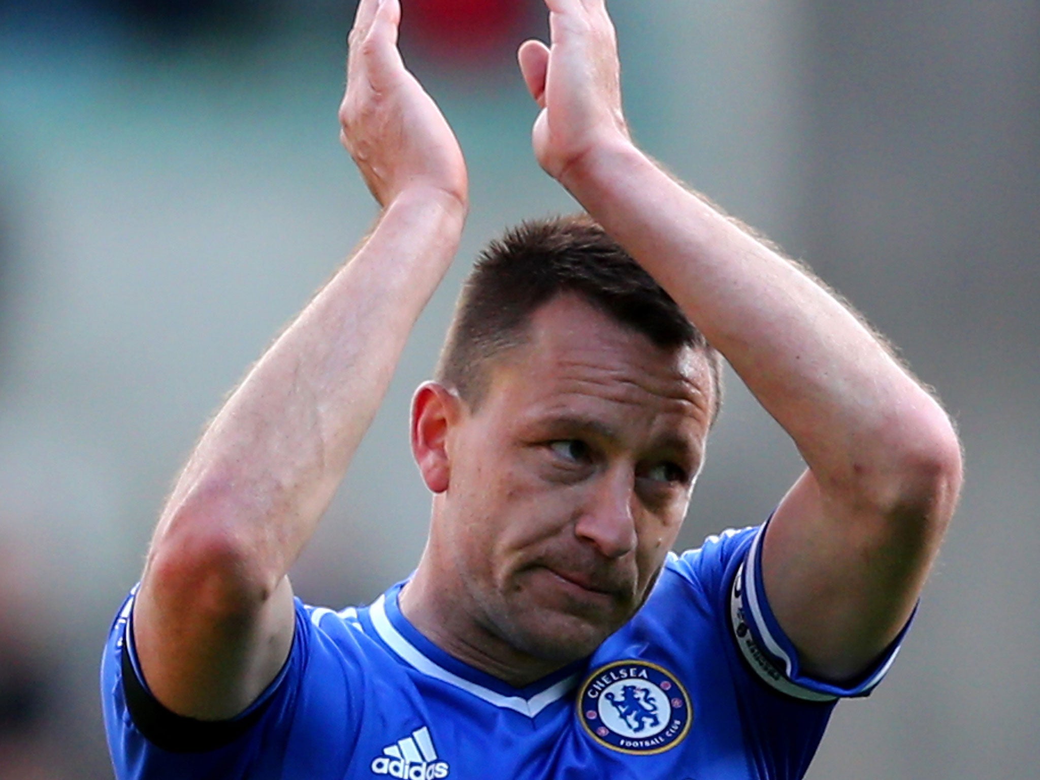 John Terry applauds the Chelsea supporters at the end of the match